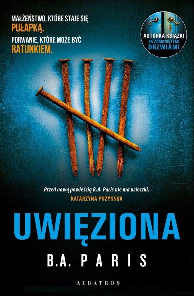 Uwięziona. Okładka